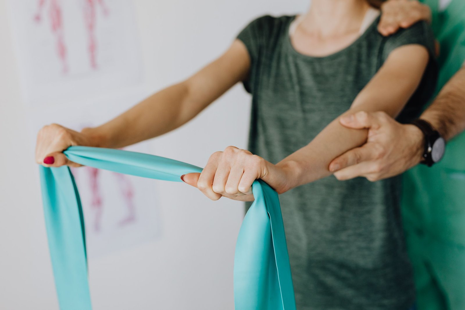 Resistance band shoulder exercise used in SLAP tear physical therapy treatment