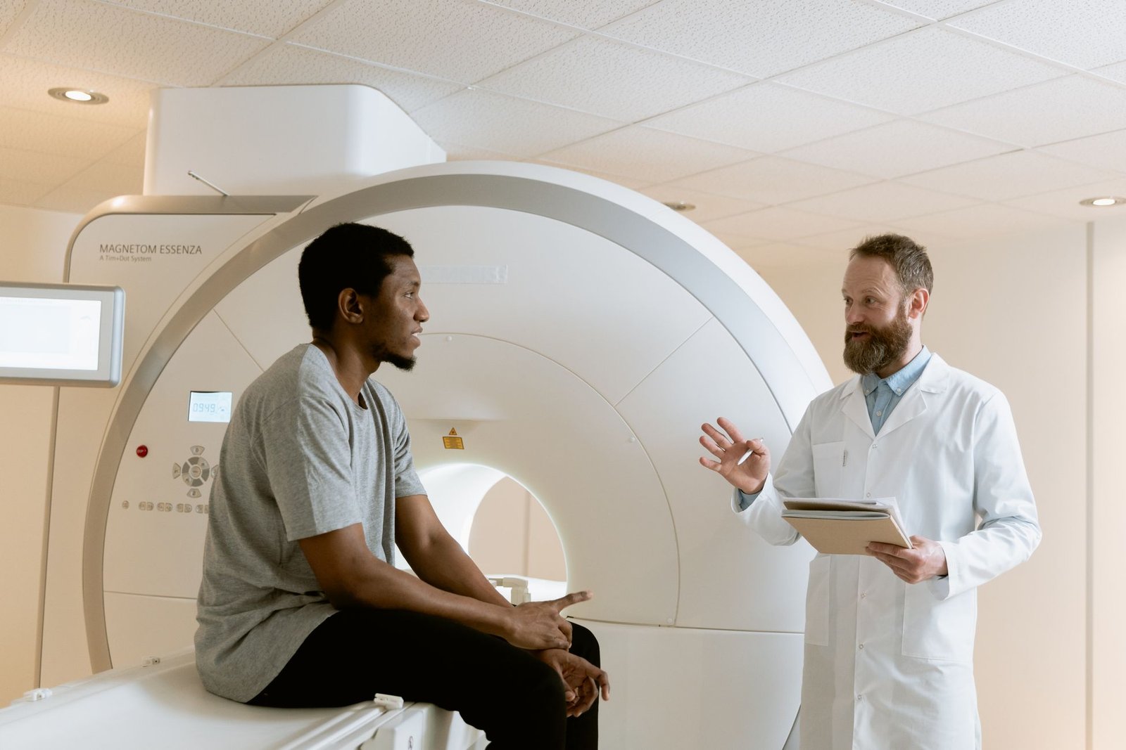 Doctor discussing imaging results, a step after spotting rotator cuff tear red flags