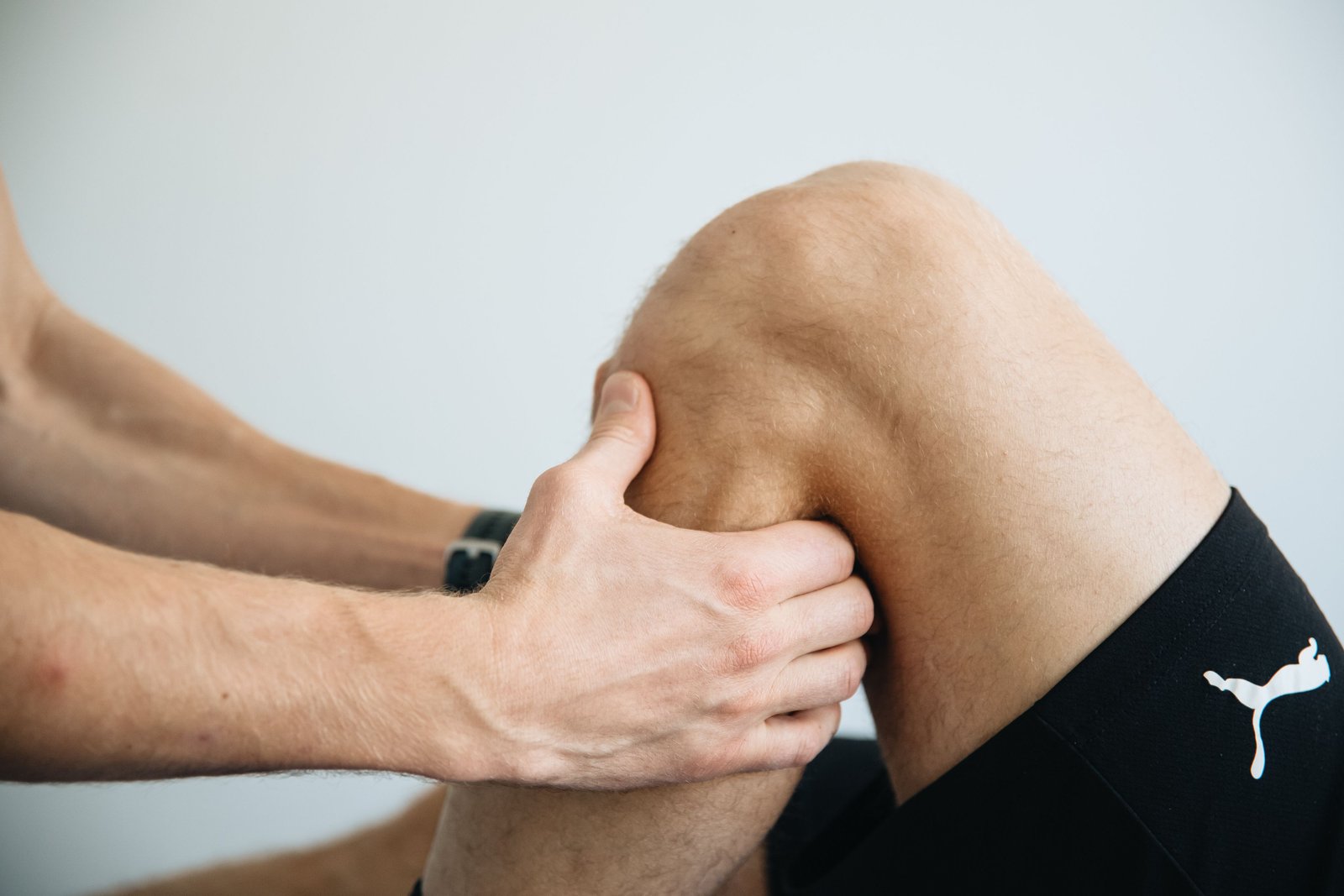 Supportive treatment used alongside progressive loading to speed up muscle strain recovery