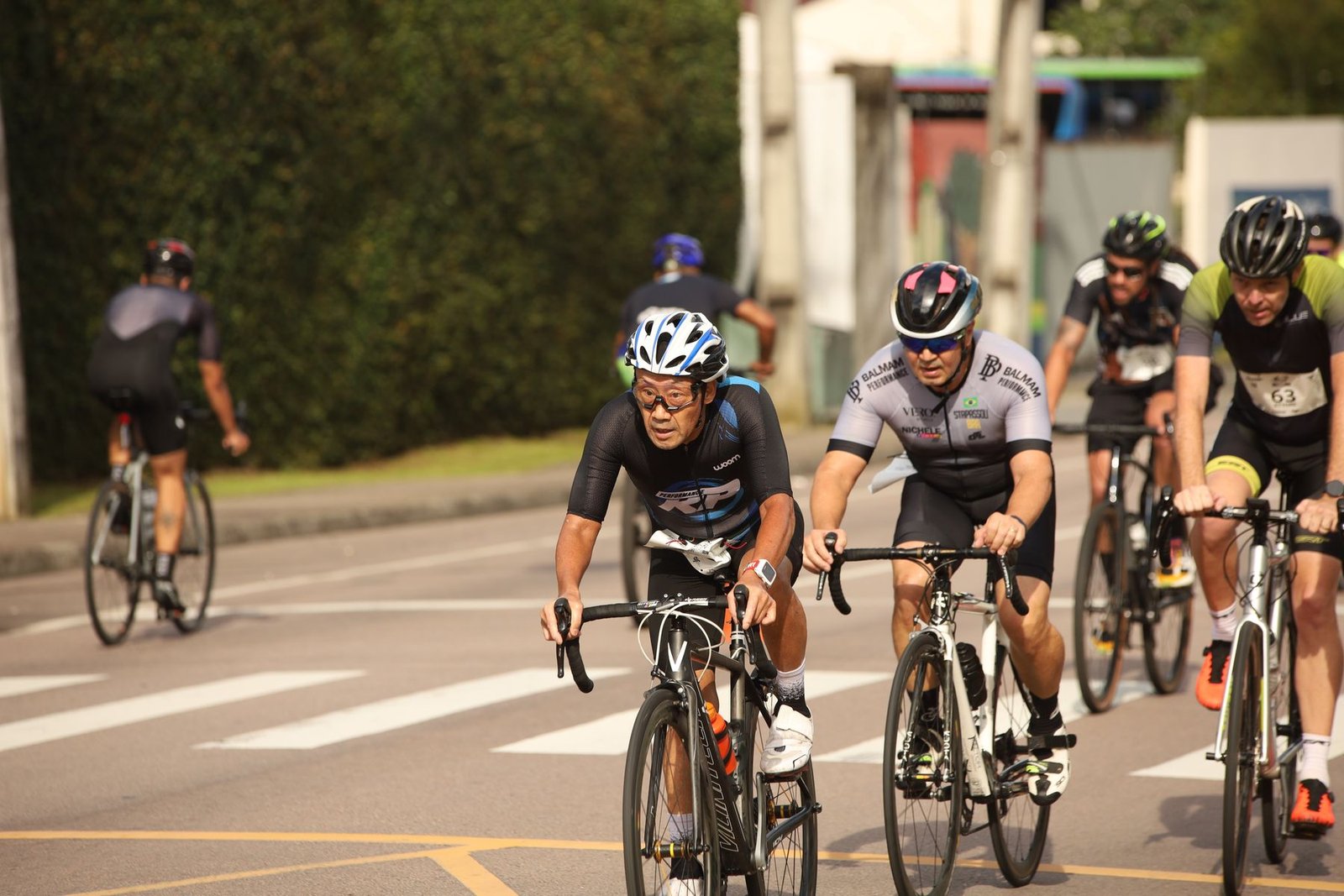 Cyclist riding on an open road, another common context for it band knee pain