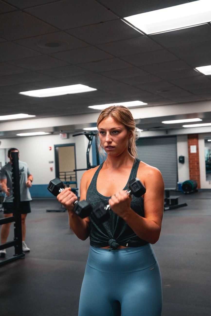 Person performing an isometric biceps hold as part of early-stage biceps tendonitis exercises