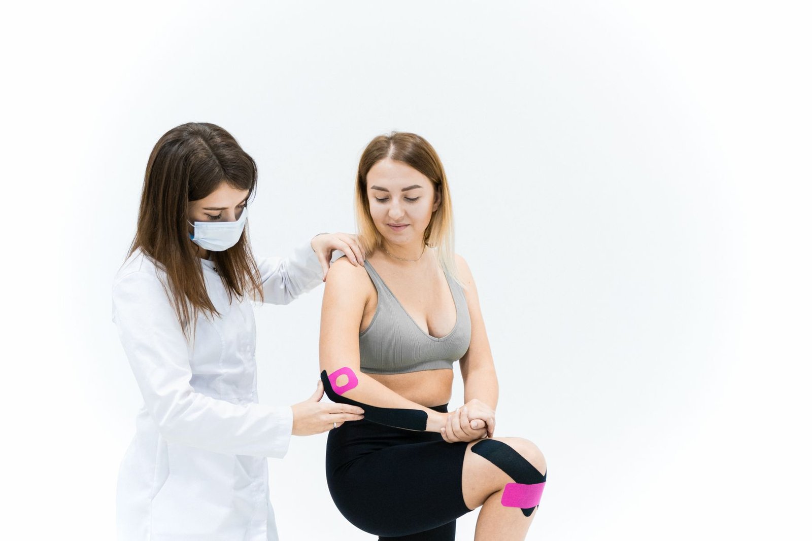 Rocktape kinesiology taping technique applied to a knee, relevant to whether kinesiology tape actually works for support