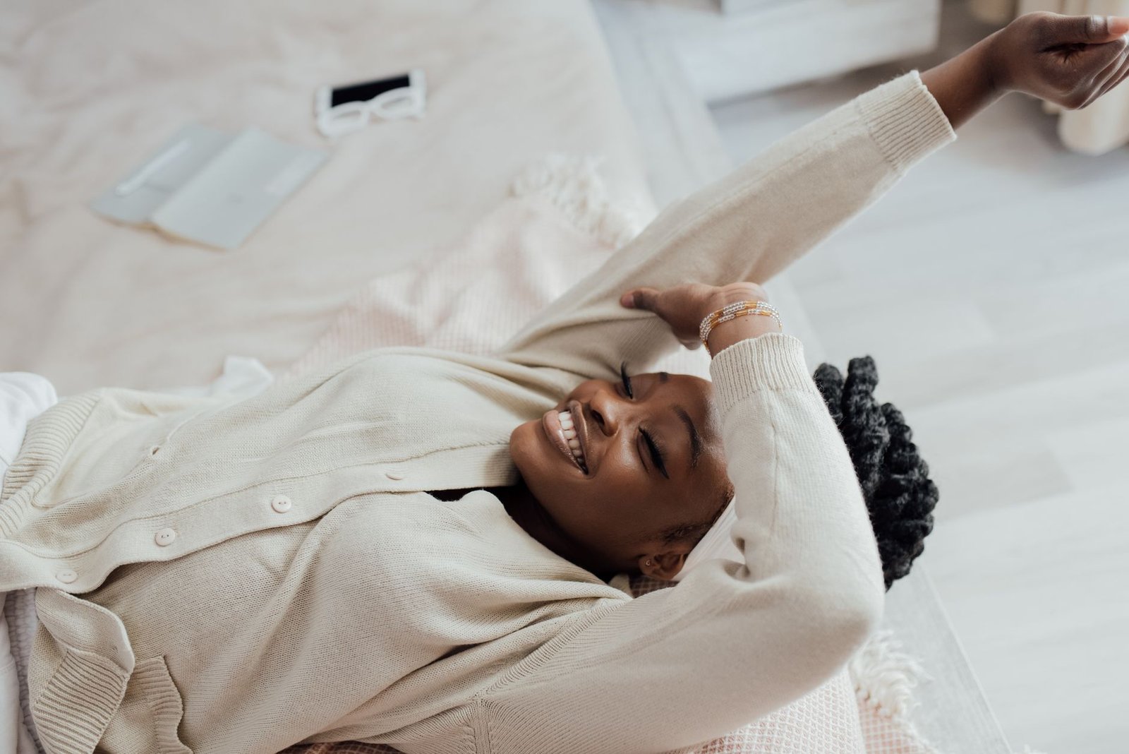 Person practicing a sciatica pain management technique before bed