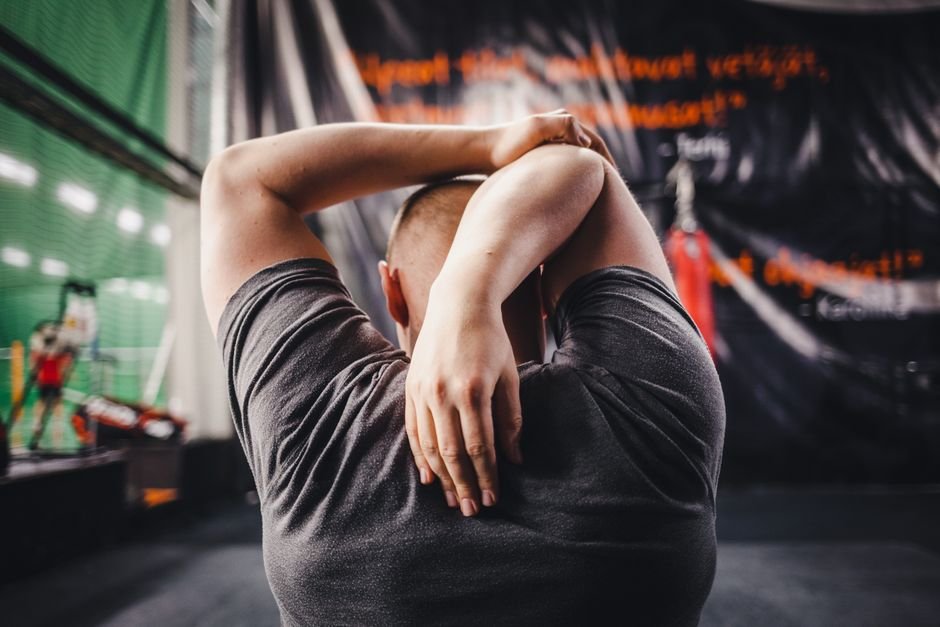 Person performing thoracic mobility middle back pain exercises