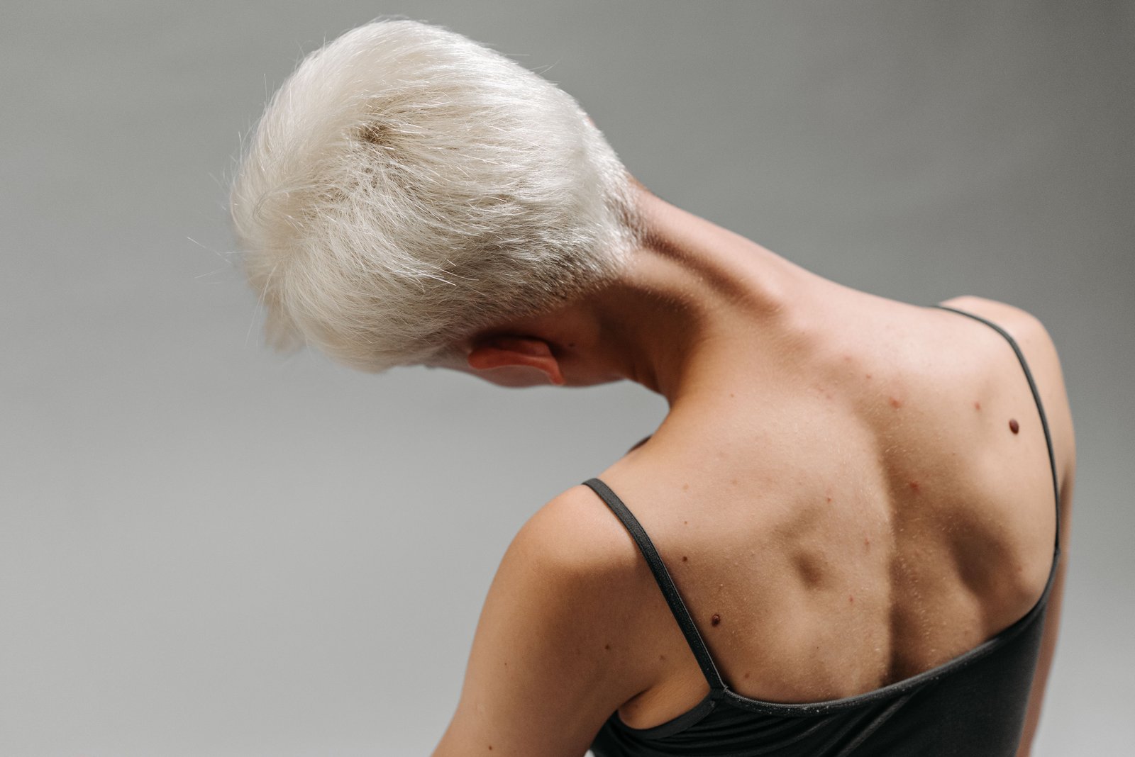 Upper back stretch relevant to easing rhomboid pain sleeping position tension